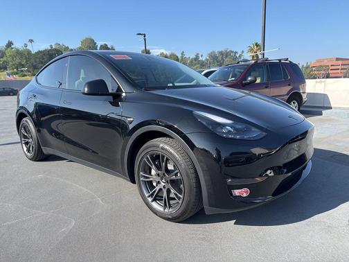 Solid Black 2024 Tesla Model Y Long Range Dual Motor All-Wheel Drive