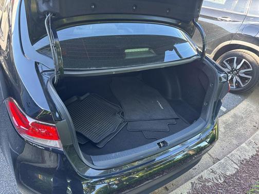 Midnight Black Metallic 2025 Toyota Corolla Hybrid LE