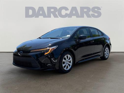 Midnight Black Metallic 2025 Toyota Corolla Hybrid LE