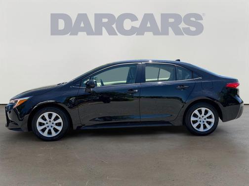 Midnight Black Metallic 2025 Toyota Corolla Hybrid LE
