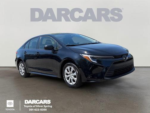 Midnight Black Metallic 2025 Toyota Corolla Hybrid LE