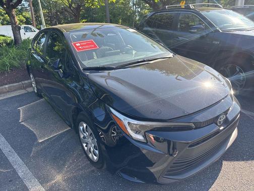 Midnight Black Metallic 2025 Toyota Corolla Hybrid LE