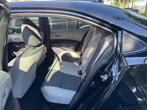 Midnight Black Metallic 2025 Toyota Corolla Hybrid LE