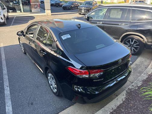 Midnight Black Metallic 2025 Toyota Corolla Hybrid LE