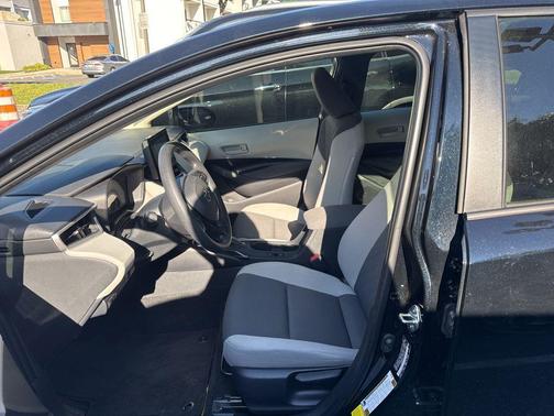Midnight Black Metallic 2025 Toyota Corolla Hybrid LE