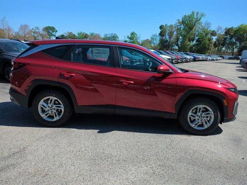 Red 2026 Hyundai TUCSON SE