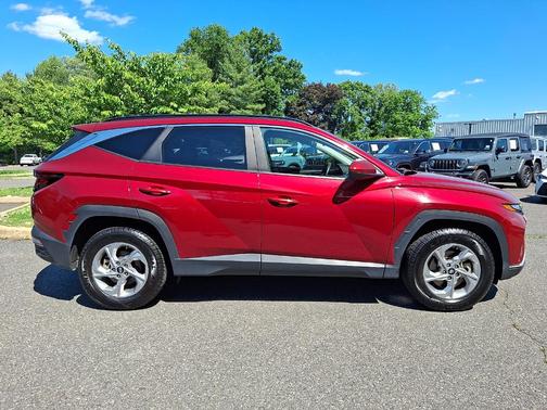 Red 2024 Hyundai TUCSON SEL