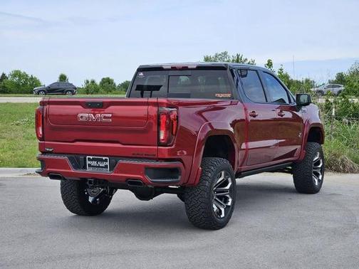 Volcanic Red Tintcoat 2026 GMC Sierra 1500 AT4