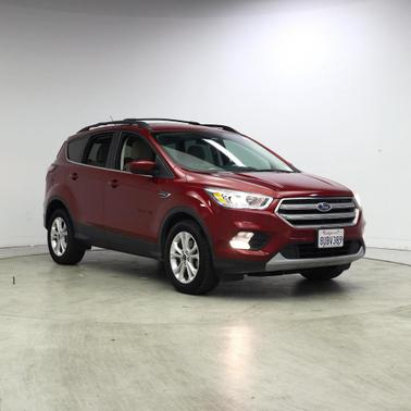 Red 2017 Ford Escape SE