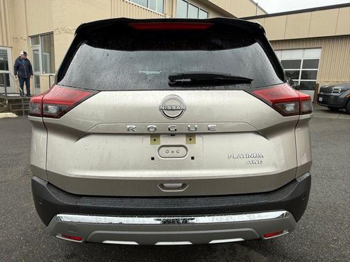 Champagne Silver Metallic/Super Black 2023 Nissan Rogue Platinum