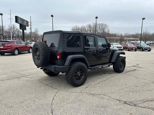 Black Clear Coat 2015 Jeep Wrangler Unlimited Sport