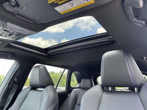 Blizzard Pearl/Midnight Black Metallic 2021 Toyota RAV4 Hybrid SE