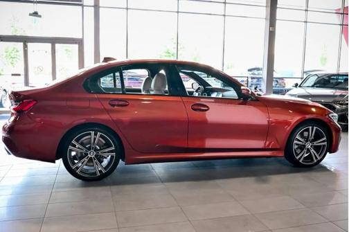 Sunset Orange Metallic 2021 BMW 330 xDrive