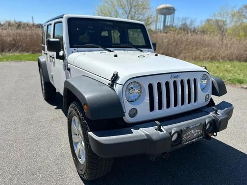 White 2016 Jeep Wrangler Unlimited Sport