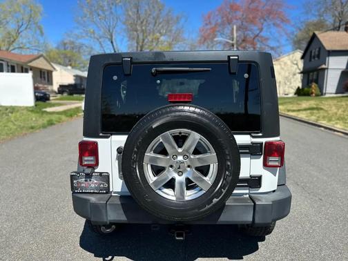 White 2016 Jeep Wrangler Unlimited Sport