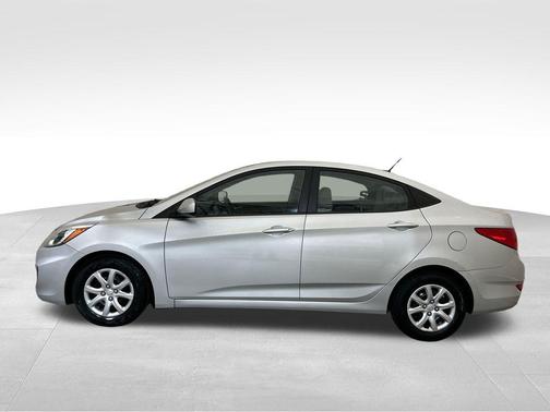 Ironman Silver Metallic 2015 Hyundai Accent GLS