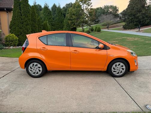 Orange 2016 Toyota Prius c BASE