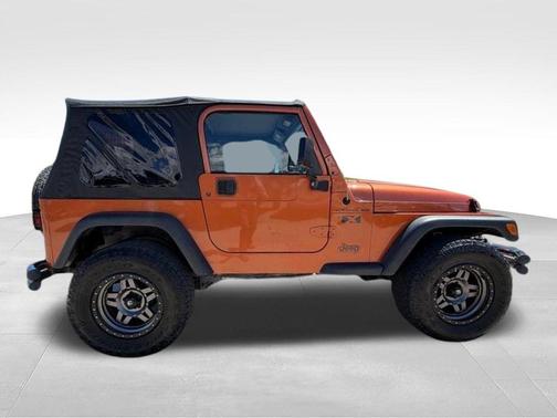 Orange 2002 Jeep Wrangler X