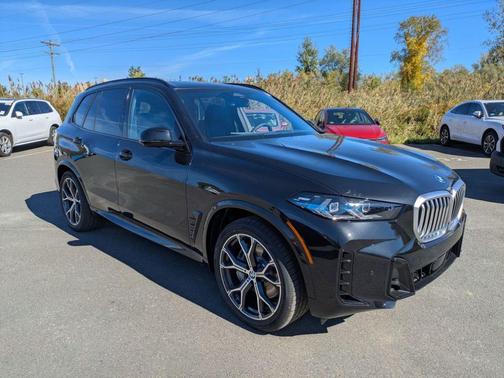 Black Sapphire Metallic 2026 BMW X5 PHEV xDrive50e