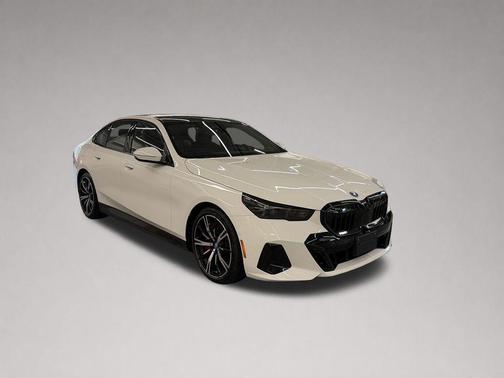 Alpine White 2025 BMW 550e xDrive