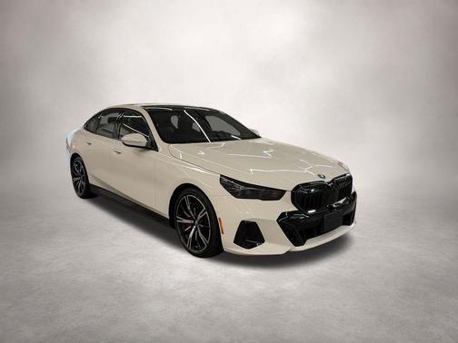 Alpine White 2025 BMW 550e xDrive