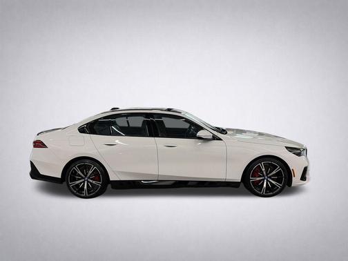Alpine White 2025 BMW 550e xDrive