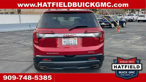 Volcanic Red Tintcoat 2023 GMC Acadia AWD AT4