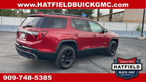 Volcanic Red Tintcoat 2023 GMC Acadia AWD AT4