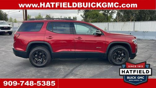 Volcanic Red Tintcoat 2023 GMC Acadia AWD AT4