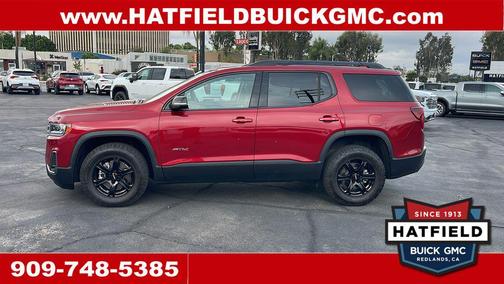 Volcanic Red Tintcoat 2023 GMC Acadia AWD AT4