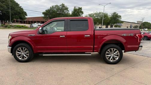 Red 2015 Ford F-150 Lariat Truck