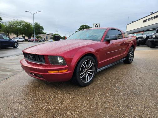 Red 2005 Ford Mustang Deluxe