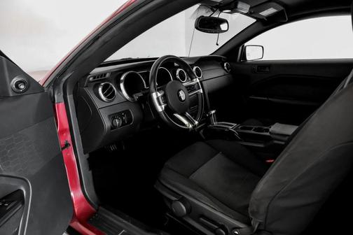 Red 2005 Ford Mustang Deluxe