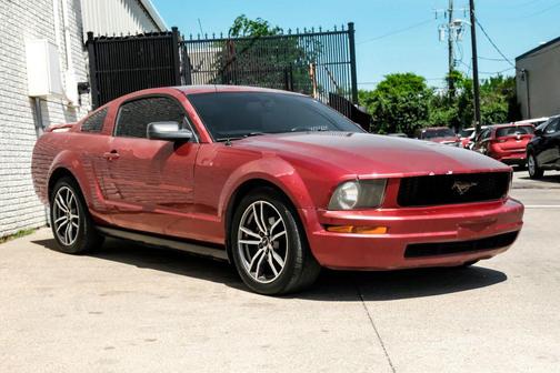 Red 2005 Ford Mustang Deluxe