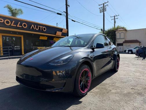 Gray 2025 Tesla Model Y Long Range Dual Motor Rear-Wheel Drive