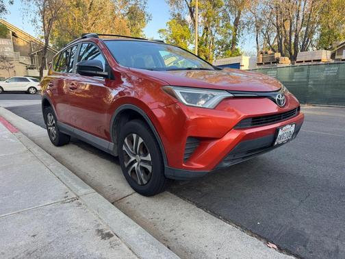 Orange 2016 Toyota RAV4 LE