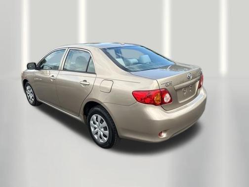 Beige 2010 Toyota Corolla LE