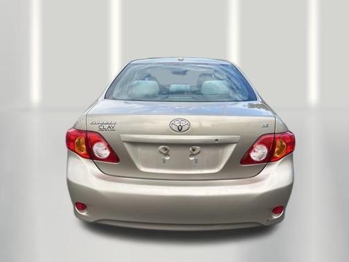 Beige 2010 Toyota Corolla LE