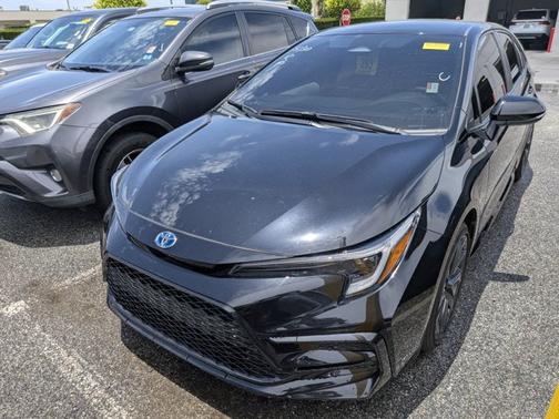 Midnight Black Metallic 2024 Toyota Corolla Hybrid SE