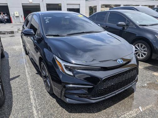 Midnight Black Metallic 2024 Toyota Corolla Hybrid SE