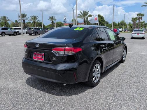 Midnight Black Metallic 2025 Toyota Corolla Hybrid LE