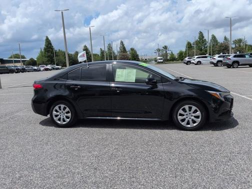 Midnight Black Metallic 2025 Toyota Corolla Hybrid LE