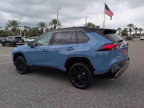 Cavalry Blue/Midnight Black Metallic 2023 Toyota RAV4 Hybrid XSE