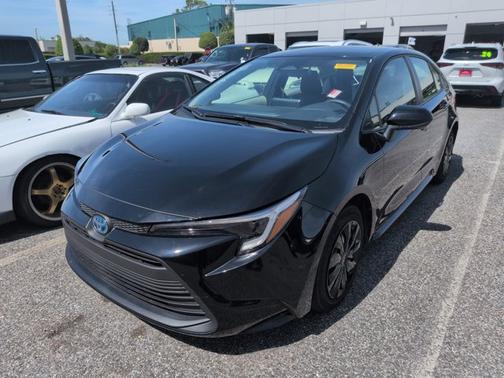 Midnight Black Metallic 2025 Toyota Corolla Hybrid LE