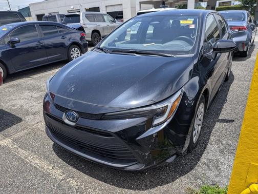 Midnight Black Metallic 2024 Toyota Corolla Hybrid LE