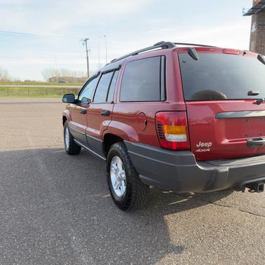 Red 2004 Jeep Grand Cherokee Laredo