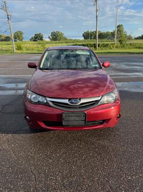 Red 2010 Subaru Impreza 2.5 i Premium