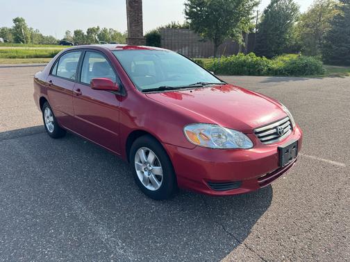 Red 2004 Toyota Corolla LE