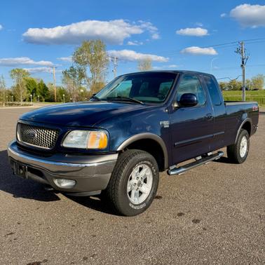 Blue 2003 Ford F-150 XLT