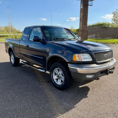 Blue 2003 Ford F-150 XLT